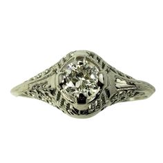 Vintage 10 Karat White Gold Filigree And Diamond Ring Size 7.75- This Sparkling Ring Features One Round Brilliant Cut Diamond Set In Beautifully Detailed White Gold Filigree. Width: 8 Mm. Shank: 1 Mm. Approximate Total Diamond Weight: .33 Ct. Diamond Clarity: Vs2 Diamond Color: J Size: 7.75 Weight: 1.0 Dwt. / 1.6 Gr. Tested 10k Gold. Very Good Condition, Professionally Polished. Will Come Packaged In A Gift Box Or Pouch (When Possible) And Will Be Shipped U.S. Priority Mail Insured. Dv102422/17k Filigree Diamond Ring, Wedding Ring Styles, Ring Styles, Vs2 Diamond, Sparkling Rings, Gold Filigree, Diamond Set, Diamond Color, Round Brilliant Cut Diamond