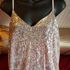 Express Silver Large Camisole Glamorous Sleeveless Top With Built-in Bra, Spring Camisole With Sequins And Spaghetti Straps, Spring Sequined Spaghetti Strap Camisole, Sequin Spaghetti Strap Camisole For Spring, Summer Sequin Spaghetti Strap Tank Top, Summer Tank Top With Sequins And Spaghetti Straps, Glamorous Spring Camisole With Spaghetti Straps, Glamorous Spaghetti Strap Camisole For Spring, Glamorous Tank Top For Night Out In Spring