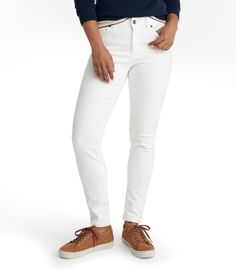 Our ultraflattering skinny jeans are guaranteed to keep their shape, even after frequent washings, eliminating bagging and stretching. Skinny-leg. Regular 30", Petite 28", Medium Tall 32". High-Rise (Classic Fit): Sits at waist. Fitted through hip and thigh. Washed Indigo - 91% cotton, 7% polyester and 2% elastane. Black - 90% cotton, 8% polyester and 2% Lycra® elastane. In a blend of 93% cotton, 5% polyester and 2% elastane. Machine wash and dry. Five-pocket styling. Fly front with button closu New Pant, Plus Size Pants, Colored Denim, Jeans For Sale, Denim Pant, Ll Bean, L L Bean, Favorite Jeans, Colored Jeans