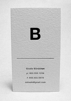 a business card with the letter b in black and white on it's front