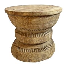 an old wooden stool made out of wood