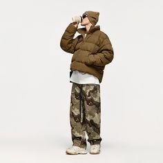 Experience unmatched warmth and style with our Short Puffer Jacket in Brown. Stay dry in any weather with this waterproof and oilproof jacket. Discover sustainable fashion today! Short Puffer Jacket, Digital Wallet, Brown Shorts, White Ducks, Duck Down, Fashion Today, Shoulder Sleeve, Cold Weather, Wide Leg Jeans