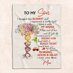 a towel with the words to my son on it, and an image of a tree