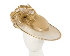 This stunning gold hat from our beautiful range of mother of the bride, evening, church and special occasion hats is hand made from combination of dull and shiny sides of luxurious fabric, fully lined and has comb for comfortable wearing. This designer fashion hat is made to order and we can make it in many colours. Just let us know the colour you like. We can also make the hat from your fabric. Please allow up to a week for the creation of the hat.  Made in Australia  Custom made to match your Cheap Trendy Gold Hats, Evening Hat, Special Occasion Hats, Mother Of The Bride Hats, Gold Hat, Occasion Hats, Beautiful Range, Gold Hats, Wedding Hat