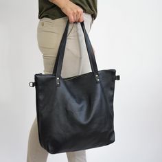 "BIG Shoulder Bag, Shopper Bag for Woman - Tote Bag - Large Crossbody Purse - Handbag with Brass Color Hardware Big SHOPPER LEATHER BAG Leather handbag made of 100% high quality natural leather. Fits all size laptops, 17\" fills the whole bag + room for a couple of books, wallet Brass Color Hardware adds style to the shoulder bag. Inside the shopper bag there is a pocket with zipper - for your keys, lip gloss, iPhone, glasses The bag can be worn on the shoulder or in hand (attachable long strap) Black Bag With Zipper Pocket For Everyday Use, Black Pouch Shoulder Bag For Everyday, Black Everyday Pouch Shoulder Bag, Black Pouch Satchel For Everyday Use, Black Tote Bag With Zipper Pocket, Black Handheld Hobo Bag For Everyday Use, Everyday Black Bag With Zipper Pocket, Black Handheld Bag For Everyday, Black Everyday Pouch Satchel