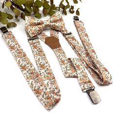 Suspenders for Men Adjustable Y Back Fabric with Strong three Clips. (Strong clamps that hold in place.) Burnt Orange Suspenders Set, Burnt Orange Light Blush Pink Background floral bow tie, Wedding bow tie, Groom bow tie, Ring bearer, Bow Tie for men, baby, boy, kids * Colors look different on computer monitors and cell phone screens. * Dimensions(Bow Tie): Size(approx.) (please specify in options) Baby> 6-18 Months: 3.3 inches  Toddler> 18 Months - 5 Years: 3.7 inches Kid> 5 - 10 Years: 4 inch Adjustable Bow Tie For Groom, Dapper Adjustable Bow Tie For Father's Day, Adjustable Dapper Bow Tie For Father's Day, Orange Bow Tie Wedding, Ring Bearer Outfit Navy, Burnt Orange Bow Tie, Orange Suspenders, Orange Bow Tie, Bow Tie Groom