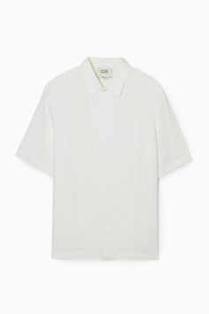 You won't want to forget this breezy shirt when packing for your next getaway. Crafted from pure linen that's light and breathable, it has a neat pointed collar, short sleeves and a concealed placket. Wear it with swim shorts whe grabbing lunch by the beach.- Regular fit- Button closure100% Linen / Machine washBack length of size M is 28.74" / Model wears a size M White Linen Camp Shirt For Spring, White Linen Camp Shirt For Summer, White Linen Short Sleeve Shirt For Vacation, White Linen Camp Shirt For Beach, White Linen Collared Short Sleeve Shirt, White Relaxed Fit Linen Short Sleeve Shirt, White Relaxed Linen Short Sleeve Shirt, Classic White Camp Shirt For Vacation, Unstructured White Short Sleeve Shirt For Summer