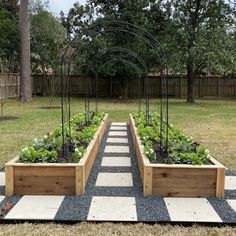 an outdoor garden area with several wooden planters