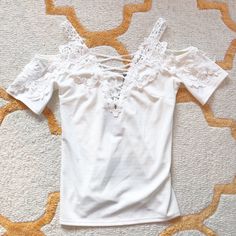 White Short Sleeved Top With Cutout Shoulder. Lace Up/Crisscross Type Front. Nwt. Made In Italy. Spring V-neck Tops With Crisscross Straps, Chic Crisscross Tops For Spring, Spring Chic Crisscross Tops, Fitted Crisscross Tops For Spring, White Summer Top With Crisscross Straps, White Crop Top With Crisscross Straps For Summer, White Top With Crisscross Straps For Summer, Summer Vacation Top With Crisscross Straps, Fitted Tops With Crisscross Straps For Day Out