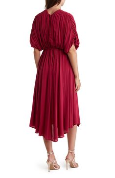 Slip into style with this puffed sleeve midi dress that exudes effortless attitude. 45" length (size S) V-neck Short puff sleeves Tied waistline 100% rayon Hand wash Imported Model stats: 5'10" height, 32" bust, 25" waist, 36" hip. Model is wearing size S. Billowy Midi Dress With Bishop Sleeves For Spring, Bishop Sleeve Midi Dress For Brunch, Billowy Midi Dress With Puff Sleeves For Daywear, Chic Billowy Midi Dress For Daywear, Flowy Midi Dress With Elastic Sleeves, Fall Solid Color Midi Puff Sleeve Dress, Billowy Bishop Sleeve Puff Sleeve Dress For Brunch, Solid Color Bishop Sleeve Midi Dress For Spring, Billowy Bishop Sleeve Puff Dress For Brunch