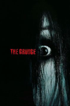 the grudge movie poster with an evil looking woman's face and dark hair