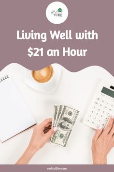 a person sitting at a desk with money and calculator