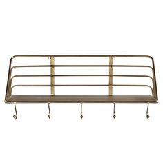 a metal shelf with three wheels and two hooks on the bottom, against a white background