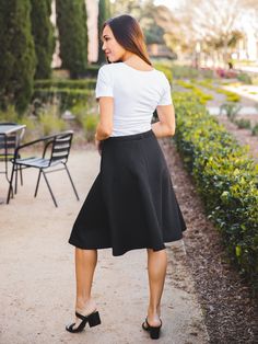 Hey there fashionista! Are you tired of wearing jeans all the time? Switch things up with our Quilted Laura Skirt in Gray. This skirt is not only stylish but also incredibly comfortable. You'll feel like you're wearing your favorite pair of sweatpants, but you'll look like a fashion icon. Pair this skirt with a simple tee, a jean jacket, and some sandals for the perfect spring outfit. It's versatile enough to wear to a casual lunch with friends or a night out on the town. Our sizing options make Everyday Flowy Midi Skirt, Flowy Everyday Midi Skirt, Casual Stretch Skirt For Everyday, Everyday Lined Midi Skirt, Everyday Spring Flowy Skirt, Chic Relaxed Skirt For Everyday, Everyday Spring Lined Skirt Bottoms, Everyday Midi Skirt For Fall, Everyday Fall Midi Skirt