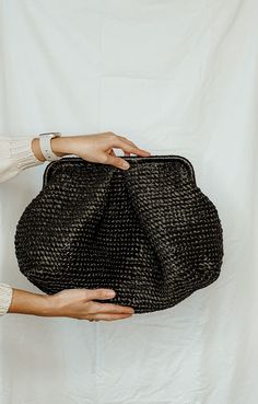 This lightweight exotic oversized straw bag is perfect for summer and is perfect for any occasion. A black oversized clutch with plenty of space inside is the perfect accessory for your summer wardrobe. Cloud bag is available to order Size: XL: Height  - 9.05 inches (23 cm) Width of the bag itself is  - 17.71 inches (45 cm) Depth - 7.87 inches (20 cm) * Please note that depending on the type and settings of your screen, the color of the product may differ slightly from the photo. Even the most p Woven Straw Tote Bag For Evening, Evening Woven Straw Tote Bag, Evening Straw Clutch Bag With Braided Handles, Chic Black Straw Bag With Woven Leather, Evening Straw Clutch With Braided Handles, Handwoven Straw Bag For Evening, Elegant Black Woven Leather Straw Bag, Evening Handwoven Straw Bag, Elegant Black Straw Bag