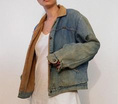 Rare vintage '60s faded Maverick Blue Bell denim jacket. Black Maverick tab on chest + Blue Bell label on inside back.  Super soft & worn-in cotton denim with best sun-faded patina! Faux fur/blanket lining in body; sleeves lining has been removed by preious owner.  Snaps up front with 2 side pockets.  Adjustable buttoned tabs at back sides of waist.  Oversized fit.  DETAILS-----> Brand:  Maverick Blue Bell (made by Wrangler) Era: '80s Fabric: 100% cotton denim MEASUREMENTS-----> Tag size: n/a - Vintage Distressed Faded Outerwear, Vintage Faded Stonewashed Denim Jacket, Retro Faded Washed Outerwear, Vintage Stonewashed Medium Wash Outerwear, Faded Retro Denim Jacket For Winter, Vintage Light Wash Distressed Outerwear, Vintage Faded Denim Outerwear, Faded Denim Vintage Outerwear, Faded Vintage Denim Outerwear