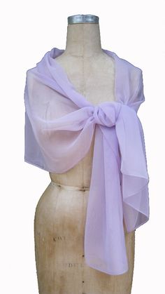 "Chiffon shawl great complimentary for you outfit. Large size of this shall allow to wear it as wrap; light weight of fabric will making elegant draping on your shoulders. Polyester fabric prevent from appearing wrinkle when wearing. Wrap, tie to make unique design as desire. Size around 17\" x 70\" Color: Lavender Fabric: Iridescent Chiffon /Poly Please contact with any questions." Elegant Silk Shawl Scarf For Summer, Elegant Silk Chiffon Scarves For Summer, Elegant Wrap For Spring, Elegant Purple Silk Scarf For Wedding, Formal Summer Shawl, Chic Summer Wedding Scarves, Elegant Summer Shawl Scarves, Elegant Summer Shawl Wrap, Elegant Summer Wrap