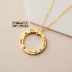 "This beautiful eternal circle necklace represents the bond between mom & children, grandma and her grandkids. It's a perfect gift for your loved one with up to 5 names. PRODUCT INFO * Material: Solid 925 Sterling Silver * Dimensions: Pendant measures ~7/8\" (23mm) in diameter * Word limits: 5 names/charm * By default, silver charm comes with BLACK engraving and gold-plated charm comes with CLEAR engraving * You can use birthstones for this necklace HOW TO ORDER * Select your preferred finis Mother's Day Birthstone Necklace Gift, Mother's Day Round Birthstone Necklace Gift, Round Birthstone Necklace For Mother's Day Gift, Mother's Day Gift: Round Birthstone Necklace, Birthstone Jewelry For Father's Day Birthday Gift, Birthstone Necklace For Birthday Gift, Round Mother's Day Necklace With Hallmark, Personalized Yellow Gold Birthstone Necklace For Mother's Day, Mother's Day Yellow Gold Birthstone Necklace For Birthday