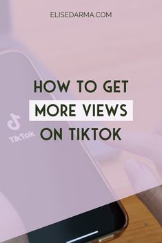 someone holding their phone with the text how to get more views on tiktok