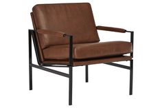 a brown leather chair sitting on top of a black metal frame with an armrest