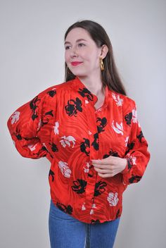 "Flowers print women retro red long sleeve blouse, Size XL Welcome to TARASCOMMON.ETSY.COM Unique clothing from the 20th century. Model tall - 170cm XL. Sleeve - 40cm / 15.74inch; ( armpit to end of sleeve); Width - 60cm / 23.62inch; Length - 65cm / 25.59inch. All measurements are taken seam to seam while lying flat. This item is vintage, so it can have some defects. Additional photos can be send We are glad that you are interested in lots that we sell. Wish you a good shopping! FOLLOW US : Inst Red Graphic Print Blouse For Fall, Long Sleeve Tops For Vintage Fashion, Spring Vintage Long Sleeve Tops, Vintage Long Sleeve Blouse For Fall, Retro Long Sleeve Blouse For Vintage Fashion, Vintage Long Sleeve Tops For Spring, Long Sleeve Blouse For Fall Vintage Fashion, Long Sleeve Blouse For Vintage Fashion In Fall, Vintage Print Long Sleeve Tops