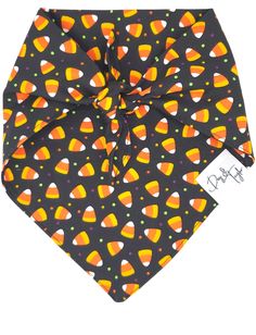 a black bandana with candy corn on it