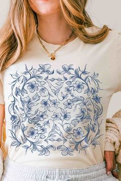 Cyanotype Floral T-shirt with a beautiful blue and white floral pattern.. #Cyanotype #FloralFashion #UniqueTshirt #ArtWear #NatureInspired #cottagecoreaesthetic #countrycore Cottagecore Tops, Blue Cotton T-shirt With Plant Print, White Cottagecore T-shirt With Floral Print, Bohemian Blue Printed T-shirt, Cottagecore Floral Print Short Sleeve T-shirt, Crew Neck Floral Print Cottagecore T-shirt, Print Shirt, Cottagecore Outfits, Cottage Core Aesthetic