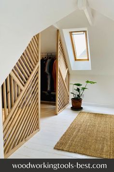 an open door leading to a bedroom with a plant in the corner and a rug on the floor