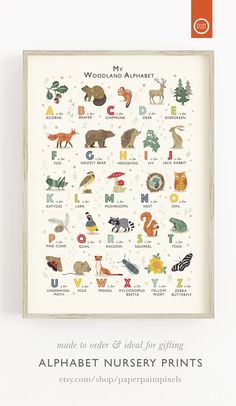 the woodland alphabet print is mounted on a wall in front of a wooden frame with an animal theme