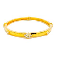 This exquisite 18k gold bangle, weighing 16.4 grams, features a dapper high finish design adorned with dazzling diamonds. The yellow gold finish enhances its luxurious appeal, making it perfect for any special occasion. The bangle is set with 1.1 carats of F-G color, VS quality diamonds in round brilliant cut shapes. With a bangle size of 2.4 and an opening diameter of 2.25 inches, this piece offers both elegance and comfort. Ideal for those who appreciate high-quality craftsmanship and timeless Formal Gold Bangle With Single Cut Diamonds, Formal Gold Bangle With Cubic Zirconia, Yellow Gold Bangle With Pave Setting For Gift, Gold Bangle With Pave Setting As Gift, Yellow Gold Wedding Bracelet With Pave Setting, Wedding Yellow Gold Bracelet With Pave Setting, Gold Round Bangle With Pave Setting, Gold Bangle With Pave Setting, Yellow Gold Bangle With Pave Setting For Anniversary