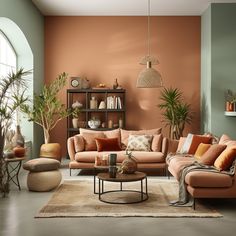 a living room filled with lots of furniture next to a tall potted palm tree