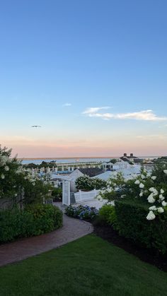 a view of the ocean from an apartment complex