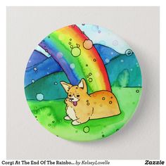 a button with a painting of a corgi at the end of the rainbow