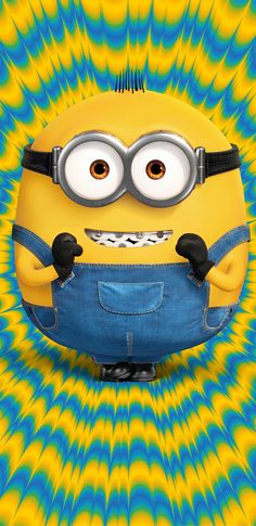 a yellow and blue minion with big eyes on it's chest, standing in front of an abstract background