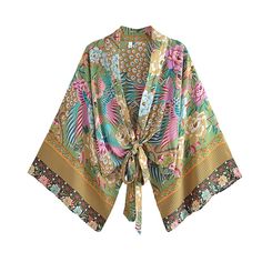 Our beautiful Metella Boho Kimono has a bold and vibrant floral with peacocks print design. Made from a lightweight cotton blend that will look great both as a summer layer or on the beach. Kimono Shirts Women, Kimono Print, Kimono Wrap Top, Boho Mode, Kimono Floral, Summer Beach Shorts, Boho Festival Fashion, Bohemian Blouses, Kimono Wrap