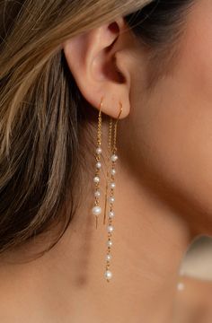 Simplicity! These the fresh water pearl earrings make a fashionable statement. The long and sexy look is striking. Long Drop Earrings Gold, Elegant Drop Pearl Earrings With Dangling Beads, Chic Dangle Pearl Earrings, Elegant Dangling Bead Pearl Earrings For Party, Elegant Gold Plated Dangle Pearl Earrings, Party Pearl Chain Drop Earrings, Elegant Dangling Pearl Earrings For Party, Dangle Linear Earrings With Pearl Charm For Party, Elegant Linear Earrings With Dangling Beads For Party