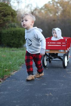 These cute flannel pants are great winter and fall pants for babies and toddlers. They are made from super soft flannel and jersey knit cuffs. All seams are serged for added durability. The waistband is made from soft, braided elastic for excellent comfort. The pants are cut larger than Cute Fall Bottoms For Playtime, Cute Fall Playtime Bottoms, Cotton Pants For Winter Playtime, Playful Bottoms For Playtime In Winter, Cotton Pants For Playtime In Fall, Flannel Boy, Baby Boy Pants, Buffalo Plaid Flannel, Plaid Baby