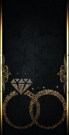 two wedding rings on a black background with gold trimmings and an ornate frame