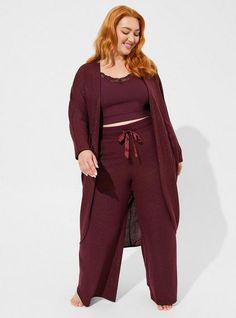 Matching Style(s): Search 11783 FIT Model is 5'9” wearing size 1. Measures 48” from shoulder (size 2). MATERIALS + CARE Super Soft Plush by Torrid™️ knit fabric: A warm, breathable fabric that’s extra cozy and comfy. Stretch level: Maximum. 48% polyester, 48% rayon, 4% spandex. Machine wash cold. Line dry. . Imported. DETAILS Open front. . Long sleeves. . Ribbed trims. . The best plus size women's super soft plush cocoon lounge cardigan sleepwear in winetasting gold shimmer made of supersoftplus Lounge Wear Plus Size Style, 70s Loungewear, Plus Size Comfy Outfits, Plus Size Lounge Wear, Women Lounge Wear, Lounge Wear Plus Size, Fall Pajamas, Lounge Cardigan, Cozy Sleepwear