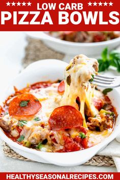 a white bowl filled with pizza bowls and cheese being lifted from the bowl by a fork