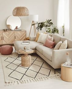 a living room filled with furniture and decor