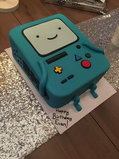 a birthday cake made to look like a gameboy