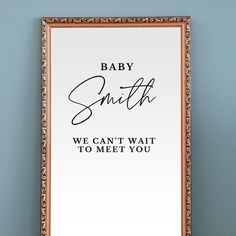 a framed sign that says, baby smith we can't wait to meet you