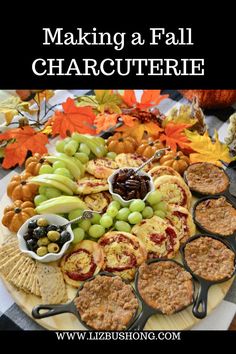 a platter filled with crackers and fruit