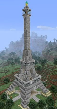 a very tall tower sitting in the middle of a field