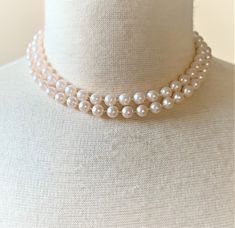 "Natural Faux Pearl Necklace with Gold Tone Spring Ring Clasp Pearls Measure 8mm in Diameter ( 1/4\" in Diameter ) Mot Pearls are Natural Pearl Color 16\" 7.00 18\" 8.50 24\" 9.50 29\" 10.50 36\" 10.50 Endless ( without clasp ) 46\" 11.00 Endless ( without clasp ) COMPLIMENTARY DOMESTIC SHIPPING" Adjustable Double Strand Pearl Jewelry, Classic Cream Round Bead Jewelry, Classic Cream Round Beads Jewelry, Classic Cream Jewelry As A Gift, Adjustable Single Strand Cream Jewelry, Adjustable Round Pearl Necklace For Formal Occasions, Adjustable Pearl Necklace For Formal Occasions, Cream Single Strand Round Jewelry, Adjustable Double Strand Formal Jewelry