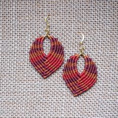 Boho Chic Micro Macrame Leaf Earrings in variegated color design. A beautiful handmade leaf design unfolds off a petite, oval base to create this super light-weight dangle earring. Available in three color variations. Chose from red, purple or blue variegated designs. Each pair is made by hand, so there is a slight variation. Earrings should be stored in a jewelry box when not in use to ensure longevity. I package each pair in a kraft jewelry box making it a perfect gift for yourself or a friend Adjustable Macrame Earrings, Adjustable Macrame Earrings For Jewelry Making, Multicolor Macrame Earrings As Gift, Multicolor Handwoven Teardrop Earrings, Handwoven Multicolor Teardrop Earrings, Adjustable Red Handwoven Earrings, Adjustable Multicolor Fair Trade Earrings, Macrame Dangle Earrings For Gift, Macrame Leaf Earrings