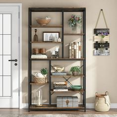 a bookshelf filled with lots of books next to a door