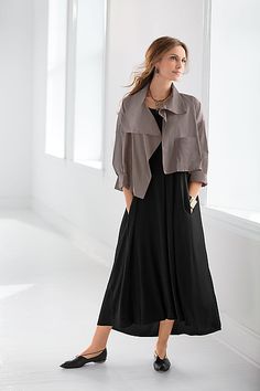 Modern Long Sleeve Evening Outerwear, Chic Spring Outerwear With Asymmetrical Hem, Chic Outerwear With Asymmetrical Hem For Spring, Chic Spring Cape Outerwear, Spring Layering Cape Outerwear, Chic Oversized Outerwear For Evening, Chic Open Front Evening Outerwear, Spring Evening Cape Outerwear, Evening Spring Cape Outerwear