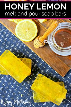 honey lemon melt and pour soap bars on a wooden cutting board next to sliced lemons